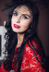 Brunette woman in red dress