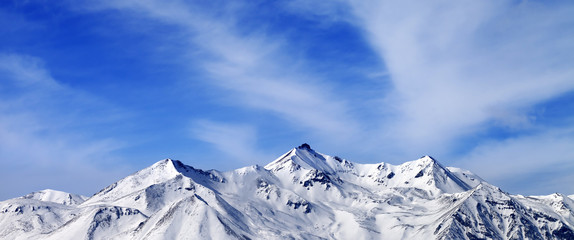 Panoramic view on winter snow mountains