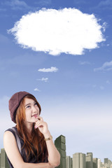 Pensive teen looking cloud speech