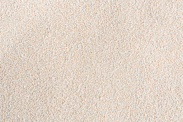 Dry yeast on top view texture background