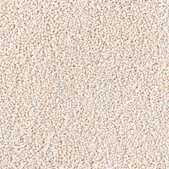 Dry yeast on top view texture background