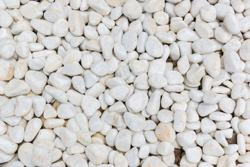 Natural white marble sea stones texture  background.