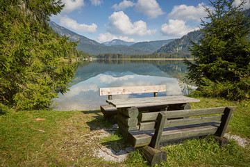 Picnic table and bench at lake Offensee in Salzkammergut