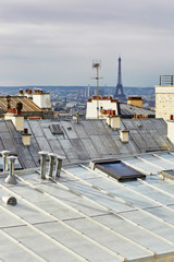 Scenic view of Parisian roofs and Eiffel tower from Montmartre