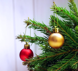 Christmas Tree and decorations on wooden background