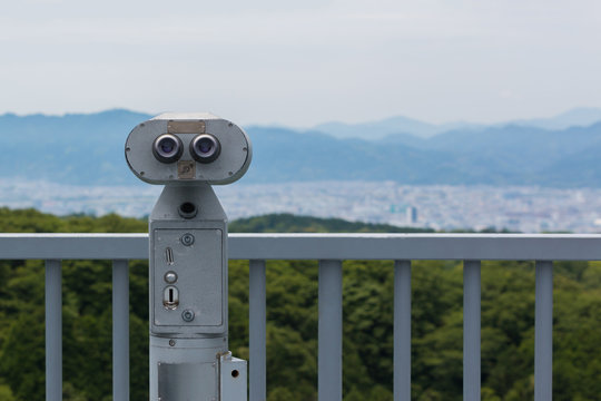 Coin Operated Binocular viewer looking out to Landscape with bea