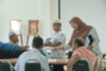 blur image of adult asian muslim education