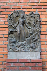 Mukachevo, Ukraine - July 21: a bas-relief on the wall closeup July 21, 2016 in Mukachevo, Ukraine