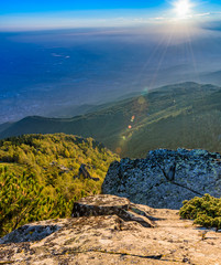 Obraz premium Sunrise over the city and the mountains at Vitosha, Sofia, Bulgaria - beautiful landscape with warm tones and autumn colors