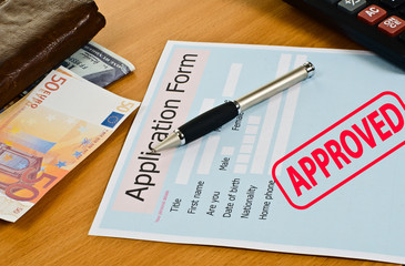 application form is on the table.