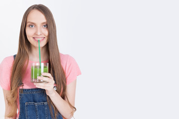 Farm girl with green smoothie