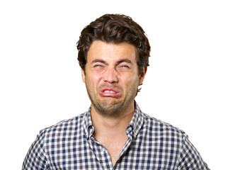 Fototapeta premium Young tired man isolated