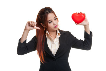 Asian business woman thumbs down with red heart.