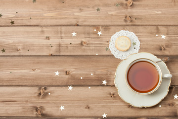 Cup Of Tea. Mince Pie. Shining Stars. Wooden Background With Cop