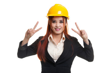 Asian engineer woman show victory sign with both hands.