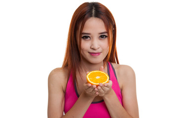 Beautiful Asian healthy girl with orange fruit.