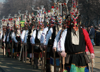 PERNIK, BULGARIA - JANUARY 30, 2016 - Masquerade festival Surva in Pernik, Bulgaria. People with mask called Kukeri dance and perform to scare the evil spirits