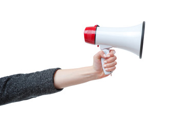 Female hand holding a megaphone. Isolated on a white background