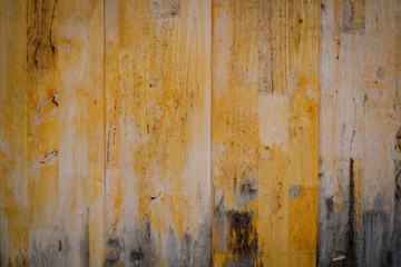 Dark yellow wooden background