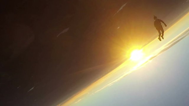 Skydiving in sunset