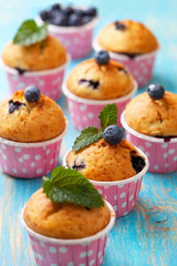 blueberry muffins in pink cases