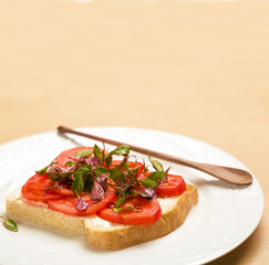 Clean food,  Watercress, Tomato slices and Whole Wheat Bread on wood background