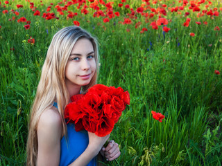 young girl in the poppy field