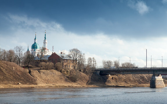Orthodox church on the river coast. Kingisepp