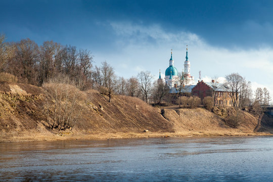 Orthodox church on river coast. Kingisepp