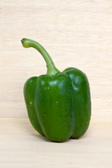 Fresh vegetables sweet Pepper or bell pepper isolated on wood