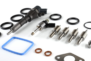 Spare parts for diesel engines on a white background