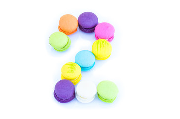 Colorful macarons,number 2 on white background