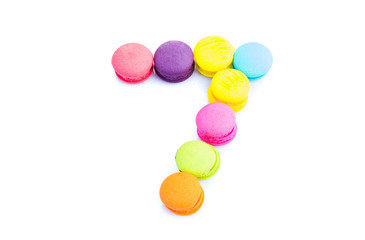 Colorful macarons,number 7 on white background