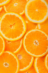 citrus background. juicy slices of orange cover the entire surface