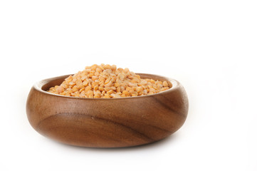 Dried beans peas in a wooden bowl on a white background. ingredient for a healthy lifestyle and diet.