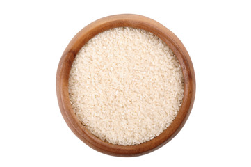 broken rice in a wooden bowl. for healthy cooking ingredient