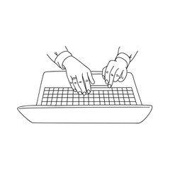 Human hands typing on a laptop keyboard