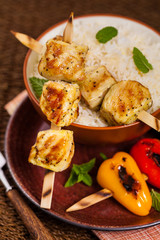 Chicken Kebab or Kabob Skewers with Rice. Selective focus. 