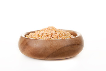 Dried beans peas in a wooden bowl on a white background. ingredient for a healthy lifestyle and diet.