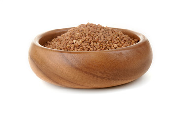 Buckwheat in a wooden bowl. for healthy cooking ingredient