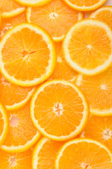 citrus background. juicy slices of  orange cover the entire surface.