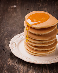  Pancakes on Rustic Wooden Board