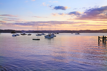 Naklejka premium Sunrise at the Bay of Islands, North Island, New Zealand.