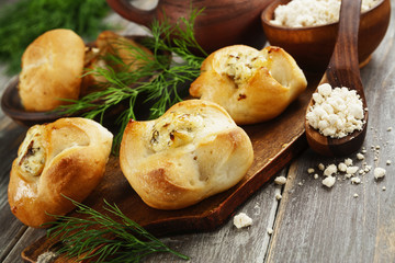 Baked buns stuffed with curd cheese