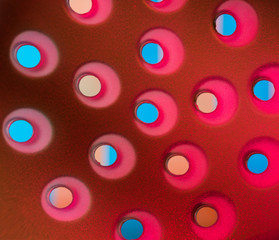 colorful plastic surface with holes