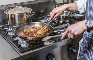 chef restaurant keeps food for hotel guests  