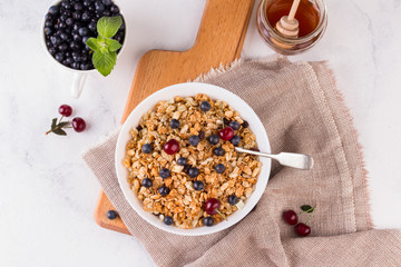 Healthy breakfast ingredients. Homemade granola.