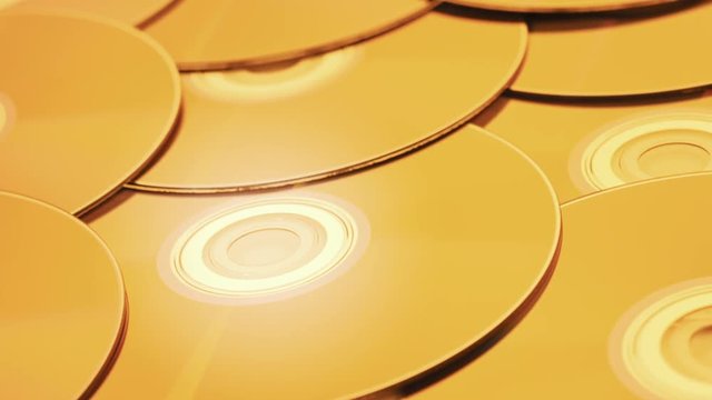 parallax tracking shot over a pile of digital versatile discs
