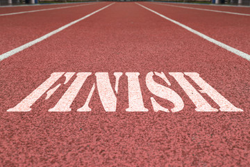 finish written on the red running track