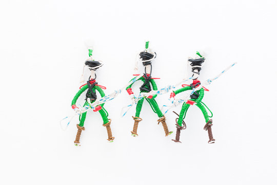 three wire toy soldiers three